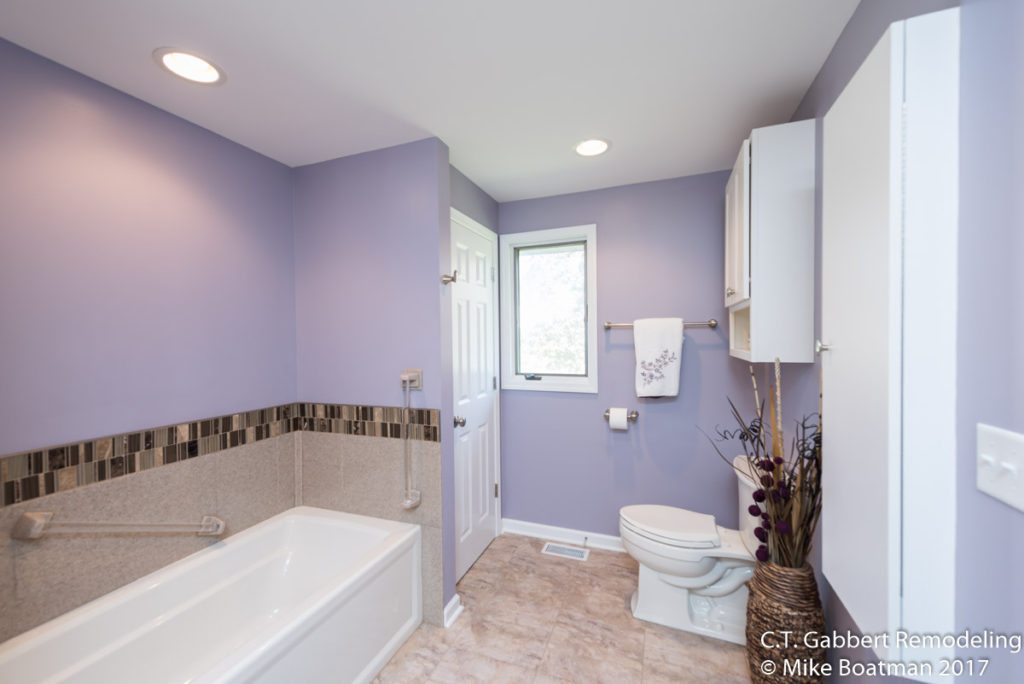 lavender bathroom with soaking tub