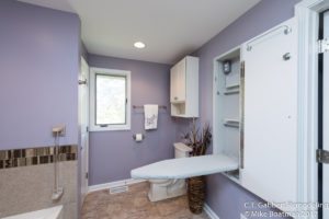 lavendar bathroom suite with pull out ironing board
