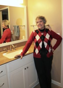 happy customer in her newly remodeled bathroom