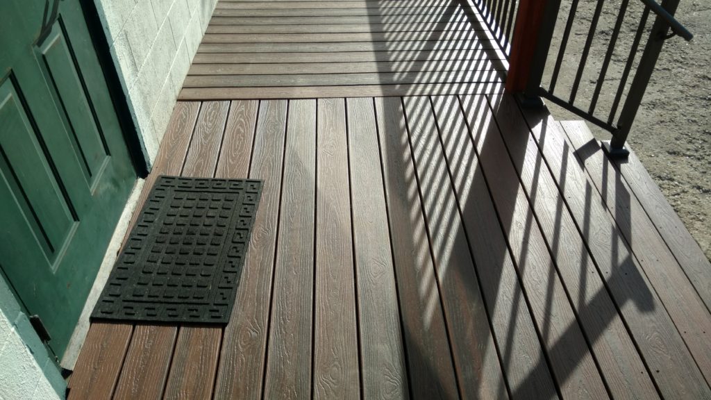 synthetic deck with aluminum railing outside of library entrance