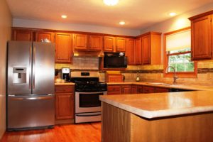 laminate countertop new backsplash and paint refresh in remodeled kitchen
