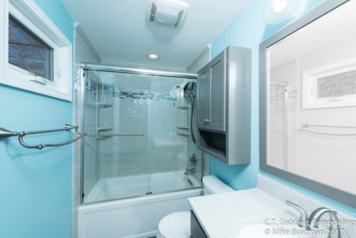 onyx countertop to match the shower in blue bathroom upgrade