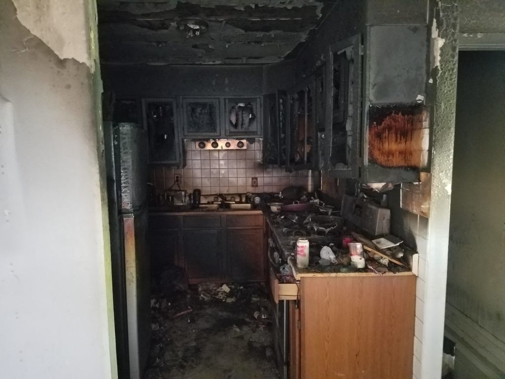 very fire damaged kitchen