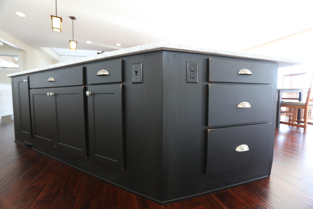 Discreet outlets blend in with black cabinets