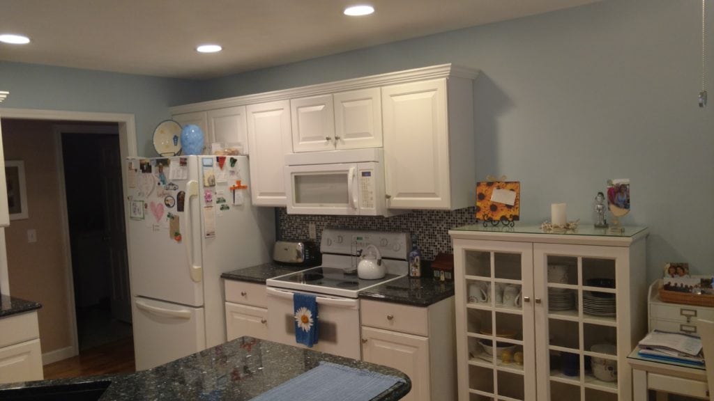 outdated white kitchen before kitchen remodeling