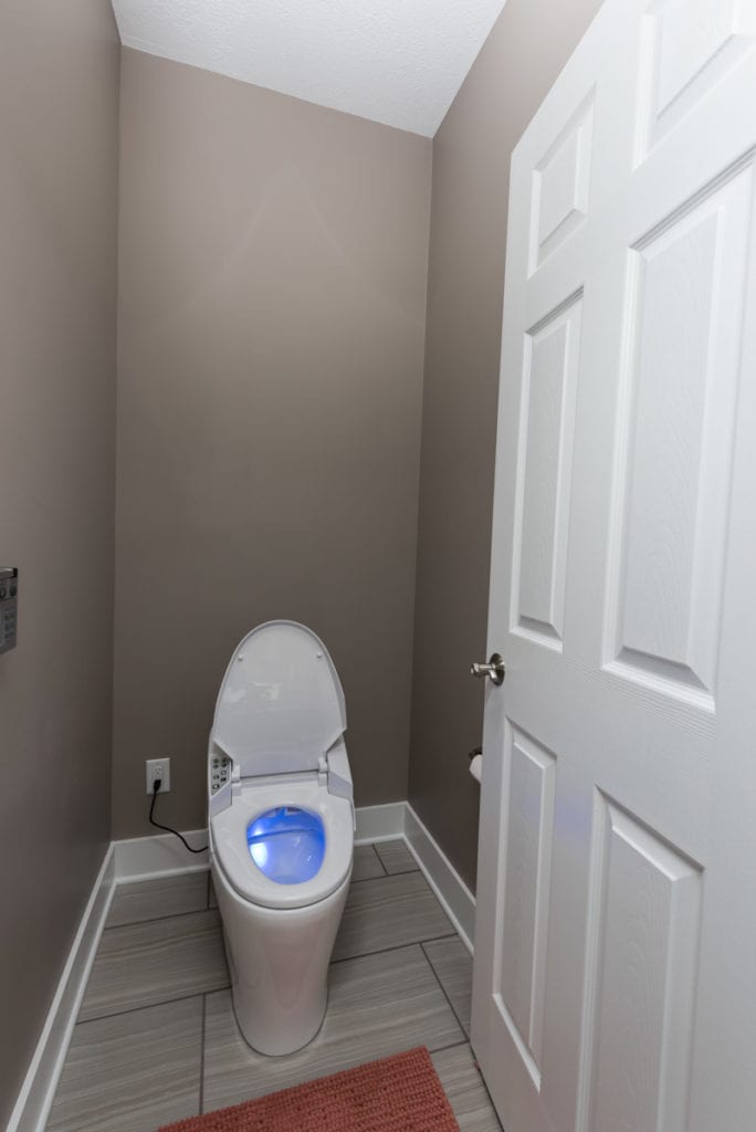 UV lighted toilet with night light